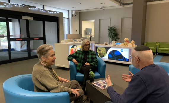 Older adults from CABHI's Seniors Advisory Panel talking to each other.