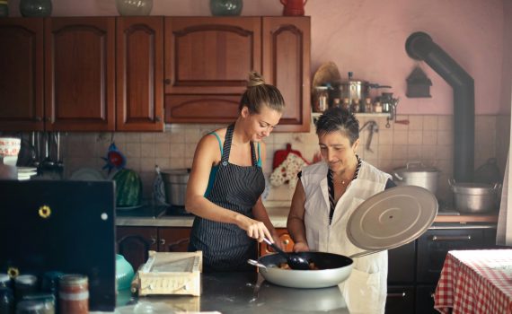 Two women cooking