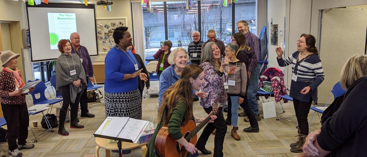 People singing and dancing in a room.