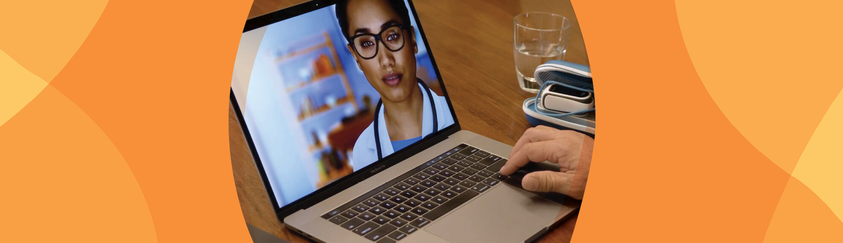 An artificial human is shown on a laptop screen.