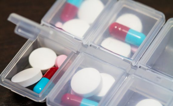 Medication portioned out into a dispenser.