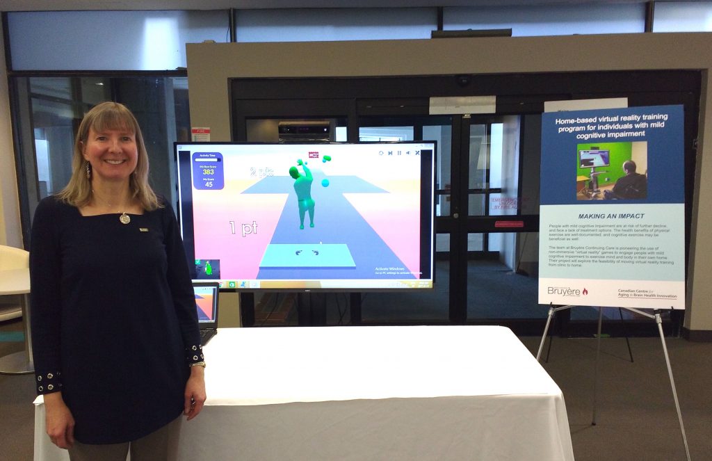 Dr. Lisa Sheehy poses with exergaming technology