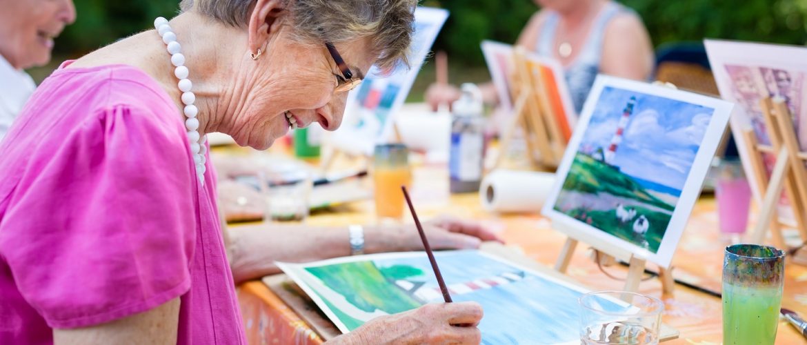 A woman painting a picture.