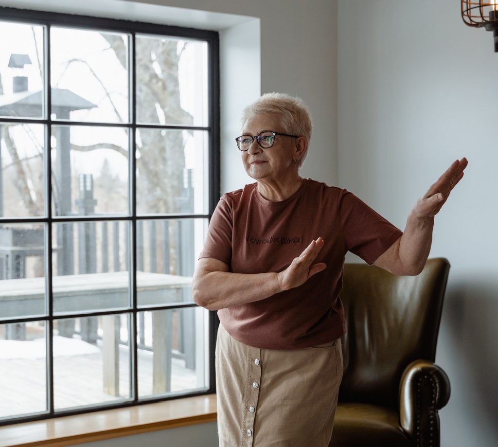 Woman dancing in her living room