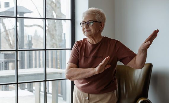 Woman dancing in her living room