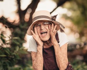 Joyful older woman in natural setting
