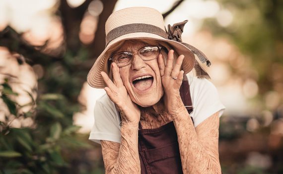 Joyful older woman in natural setting