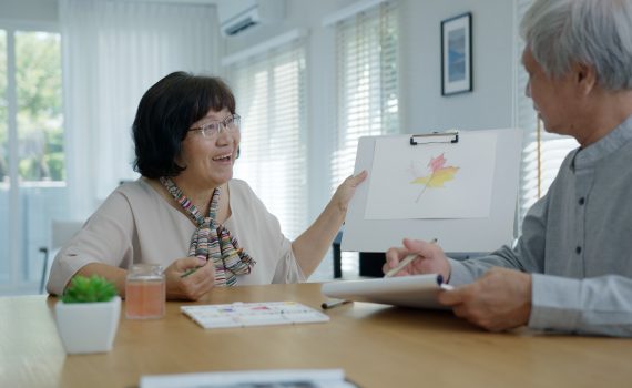 A woman and man talking