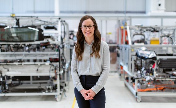 Young woman standing in a lab.